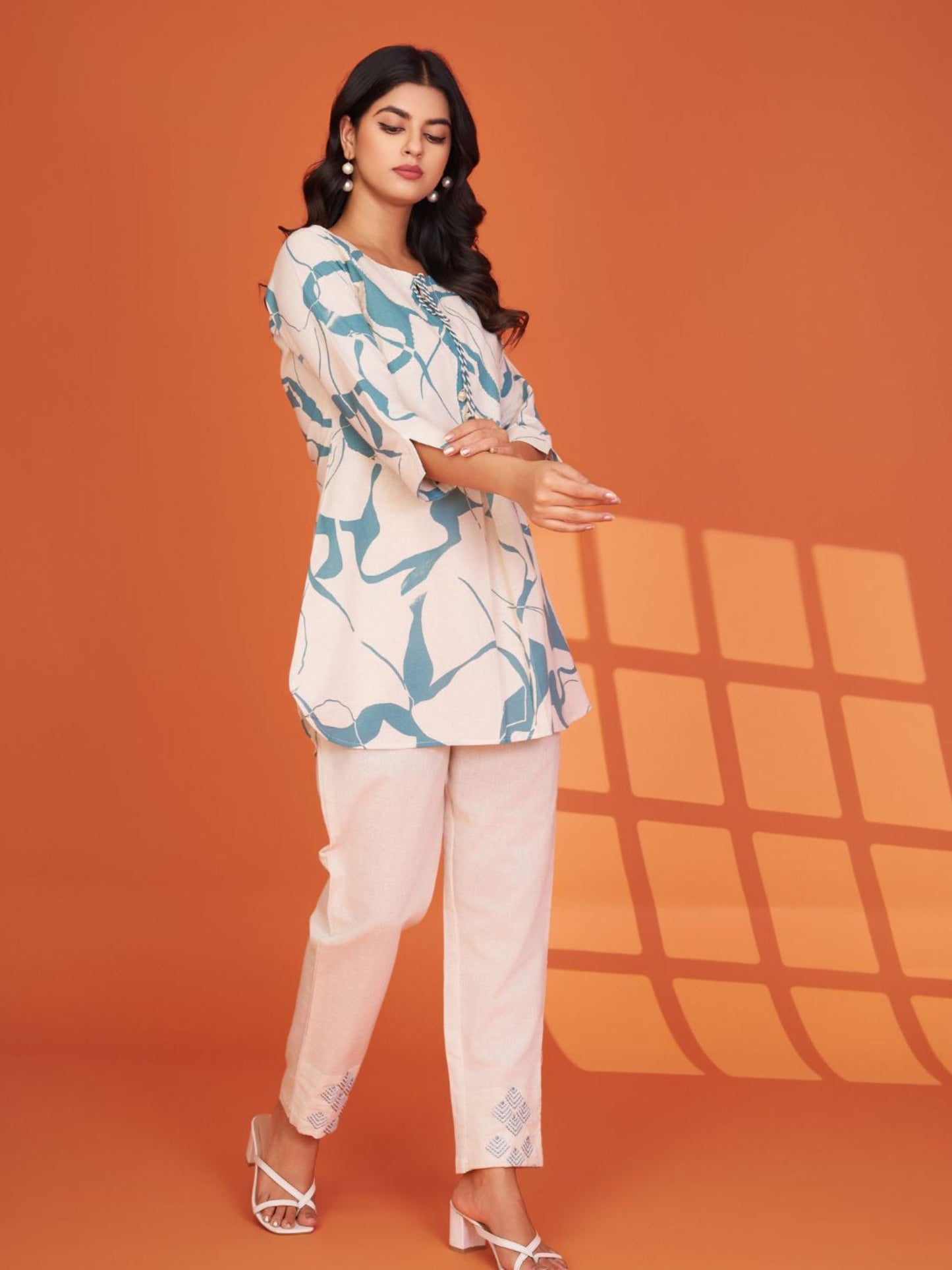 Cream Base Pale Blue Sequin Work Tassel Bottom Embroidered Co-Ord (Set of 2)