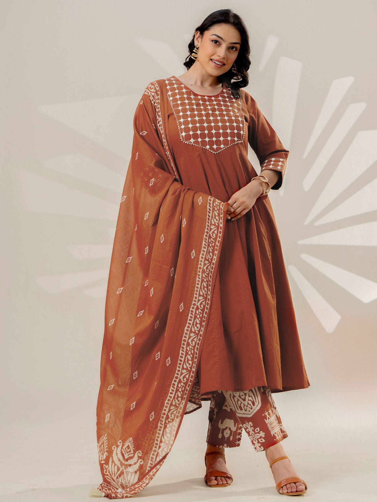 Embroidered Soft cotton Solid Flared Rust Kurta