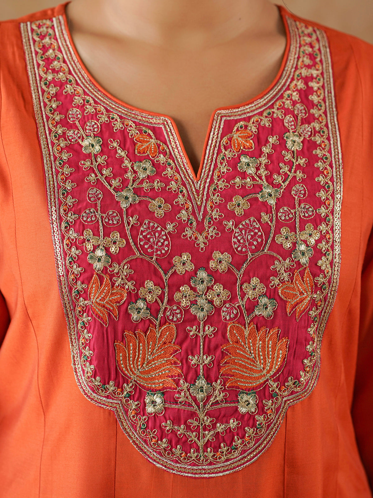 Embroidered chanderi solid anarkali orange dress