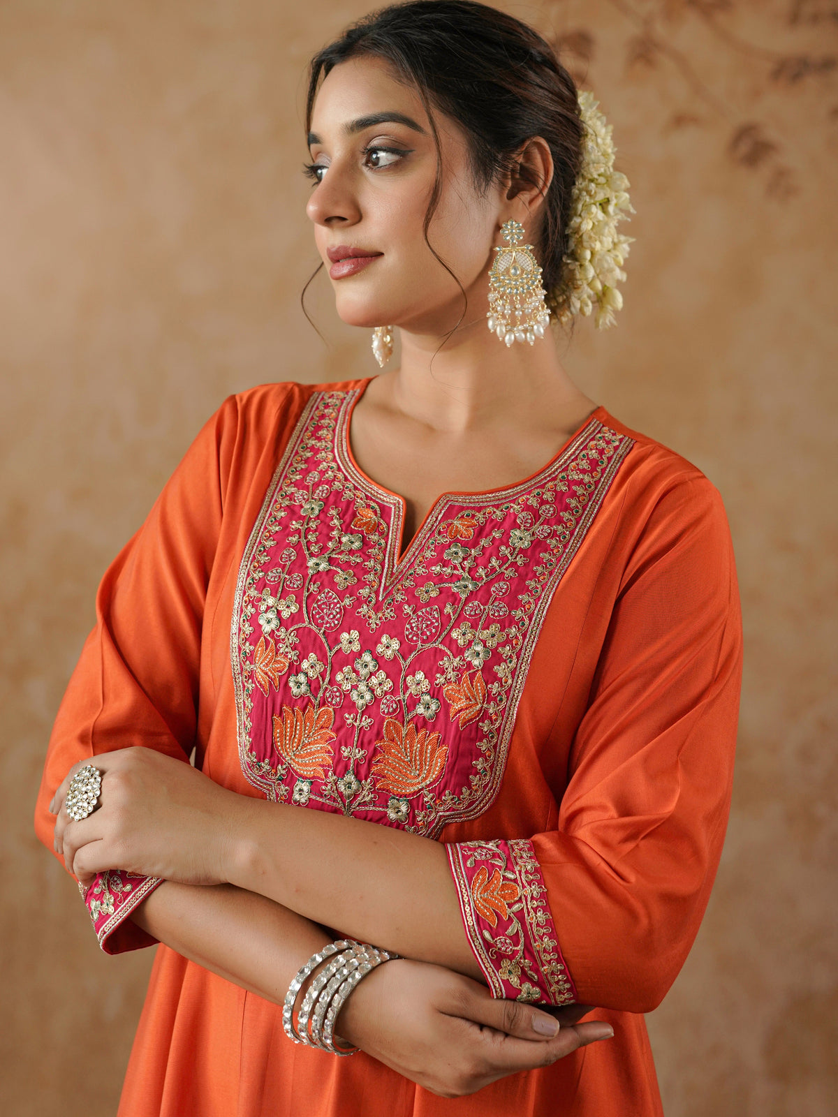 Embroidered chanderi solid anarkali orange dress