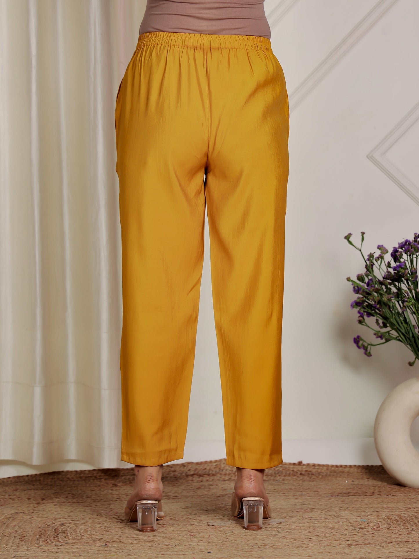Muslin Solid Yellow Flared Trousers